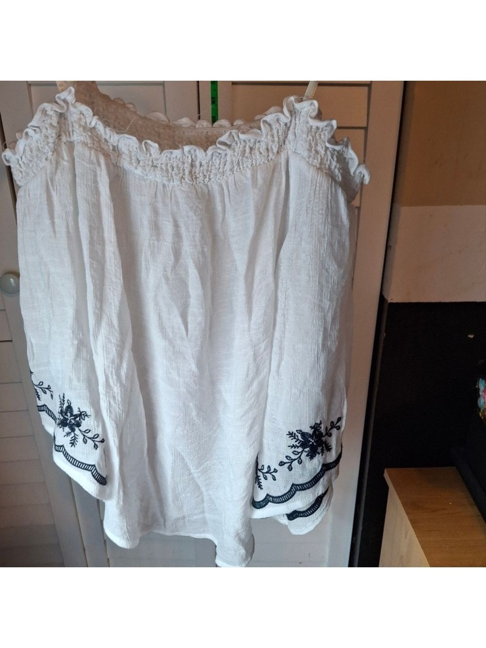 E M White Off-Shoulder Top with Blue Embroidery